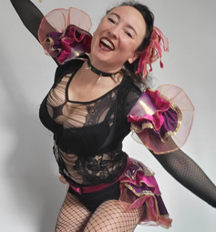Bustle and epaulettes in pink